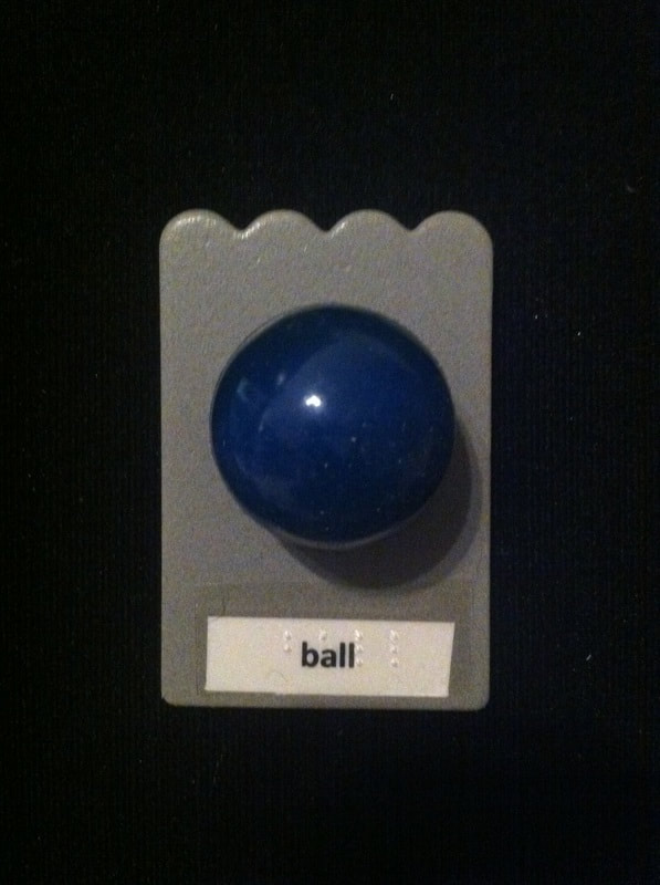 ball label with ball glued to card