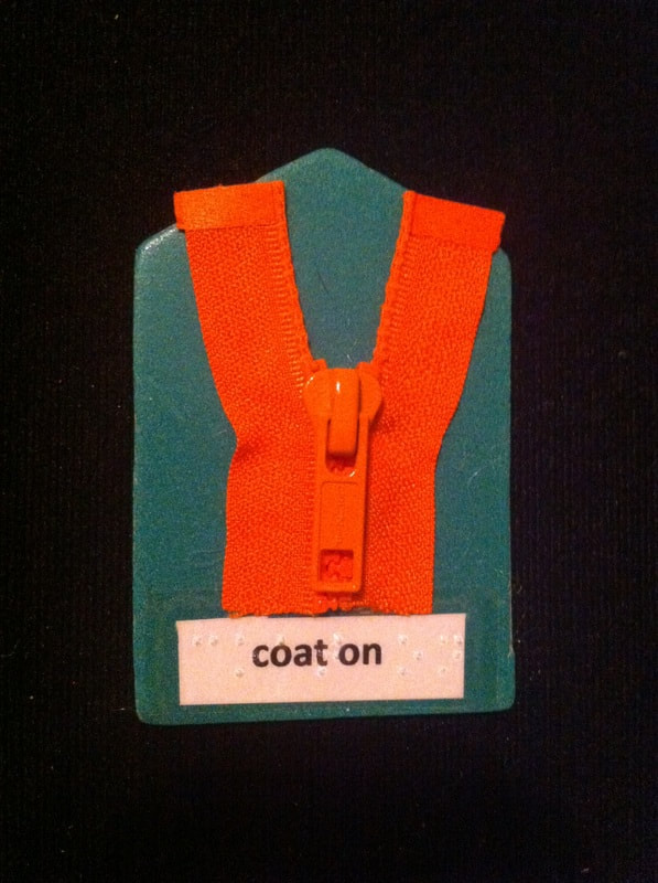 coat on label with zipper glued to card
