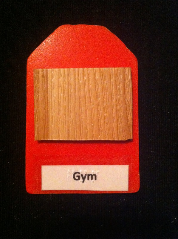 gym label with wood flooring glued to the card
