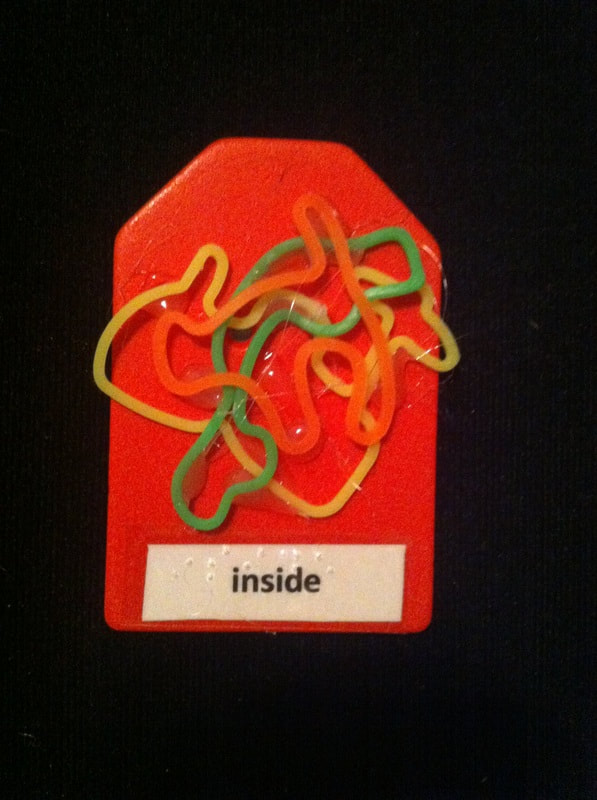 inside label with gummy bands glued to the card