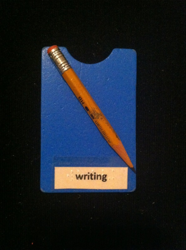 writing label with pencil glued to card