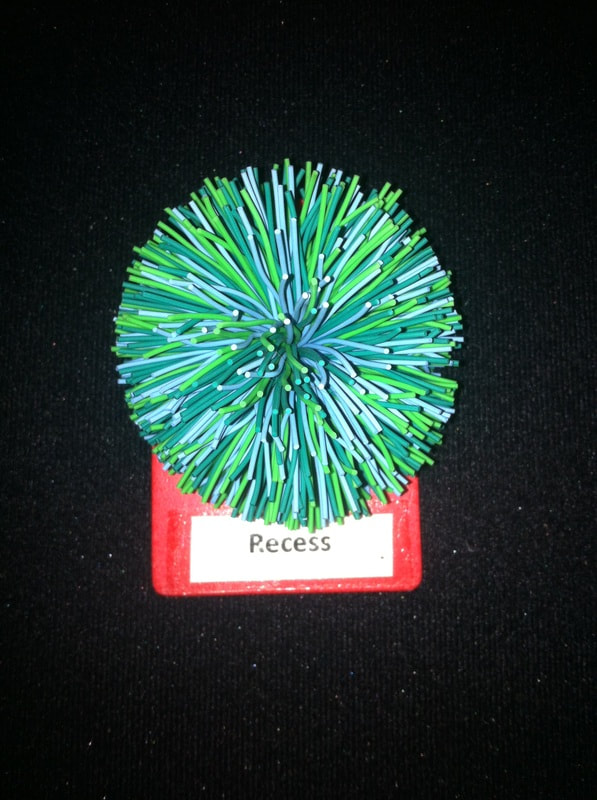 recess label with koosh ball glued to card